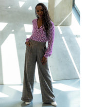 Load image into Gallery viewer, Lady wears Brooklyn Trousers: wide legged trousers with pleats at waist, and fold up hem