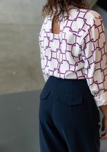 Load image into Gallery viewer, Back view of lady wearing Brooklyn trousers showing pockets with flaps