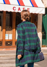 Load image into Gallery viewer, Back view of lady wearing the Ray Coat, showing a belt unfastened hanging low
