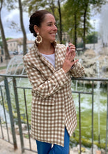 Load image into Gallery viewer, Lady wears a longline jacket coat fastened, with collar raised