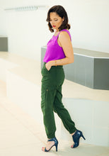 Load image into Gallery viewer, Lady wears Tremplin Trouser cargo pants, worn with heels.