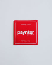 Load image into Gallery viewer, Square embroidered patch with text that reads "Merchant & Mills", "Paynter Jacket Co", and "The Field Jacket"