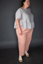 Load image into Gallery viewer, Lady wears tapered trousers with turn ups
