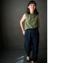 Load image into Gallery viewer, Lady wears a tapered cropped trouser, mid walk