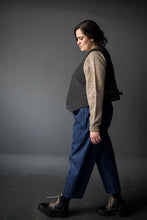 Load image into Gallery viewer, Side view of lady wearing a soft waistcoat open, layered over jumper