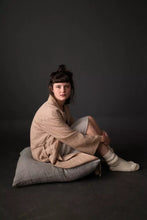 Load image into Gallery viewer, Model sat on floor cushion wears dressing gown unfastened