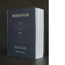 Load image into Gallery viewer, The Workwear Book from Merchant & Mills stood up open on display