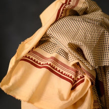 Load image into Gallery viewer, Fabric with spot print crumpled in a pile