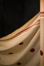 Load image into Gallery viewer, Fabric with spot print shown off a roll