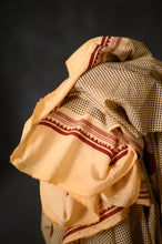 Load image into Gallery viewer, Organic cotton fabric with spot print crumpled in a pile