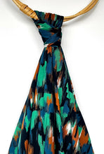 Load image into Gallery viewer, Viscose Twill fabric hangs through a loop showing fluidity