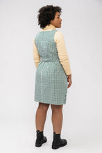 Load image into Gallery viewer, Back view of lady wearing Lilja pinafore over long sleeve top