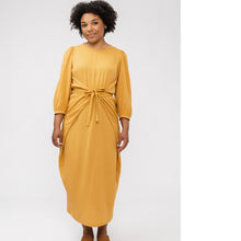 Load image into Gallery viewer, Lady wears Lilja Dress by Named Clothing with tie front detail