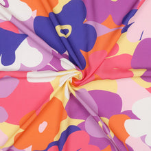 Load image into Gallery viewer, Eco Viscose fabric with a bold, retro-style floral pattern, displayed with a central swirl showing soft drape