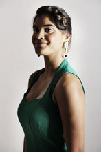 Load image into Gallery viewer, Close up of lady wearing a sleeveless, sweetheart neckline dress