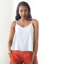 Load image into Gallery viewer, Lady wears The Ogden Cami from True Bias, a v-neck camisole with spaghetti straps.
