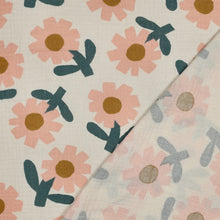 Load image into Gallery viewer, Pattern print of large flower motifs on natural base organic cotton double gauze fabric, shown folded with reverse side on display
