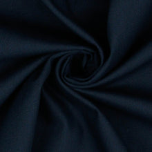 Load image into Gallery viewer, Close up of organic cotton fabric with central swirl