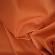 Load image into Gallery viewer, Organic cotton poplin fabric shown slightly crumpled