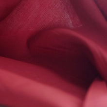 Load image into Gallery viewer, Organic cotton voile fabric shown with light for sheerness