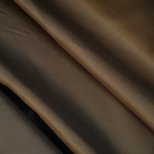 Organic cotton voile fabric displayed in soft folds