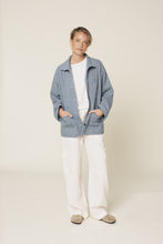 Load image into Gallery viewer, Lady stands with hands in front patch pockets on jacket. Jacket worn open, a slightly oversized style fit