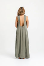 Load image into Gallery viewer, Back view of lady wearing a full length dress, low scoop (to above waist) neckline
