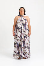 Load image into Gallery viewer, Lady stands wearing dress with crossover halter neck straps