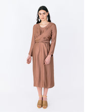 Load image into Gallery viewer, Lady wears a midi length dress with a long sleeve wrap across top