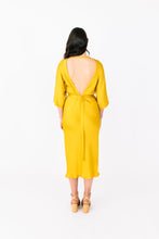 Load image into Gallery viewer, Back view of lady wearing 3/4 sleeve dress with deep V back neckline
