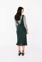 Load image into Gallery viewer, Back view of lady wearing a sleeveless dress with low V back neckline, worn over a long sleeve polo neck top