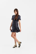 Load image into Gallery viewer, Lady wears a short sleeve dress with bias cut skirt, knee length