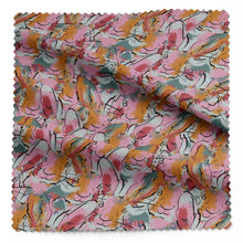 Load image into Gallery viewer, Unique EcoVero Viscose fabric shown with folds in soft drape, with large outlines of hares' heads amongst a backdrop of brushstrokes