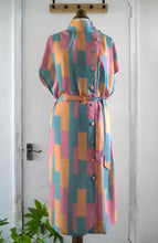 Load image into Gallery viewer, Asymmetric dress on mannequin made with Radiant EcoVero Viscose Fabric