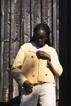 Load image into Gallery viewer, Lady wears a short double breasted jacket