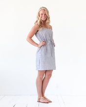 Load image into Gallery viewer, Lady wears The Southport Dress by True Bias: a button up front tank top with elasticated waist and knee length skirt