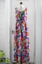 Load image into Gallery viewer, Sleeveless maxi dress with waist tie displayed on mannequin, made with Vibrations Viscose fabric