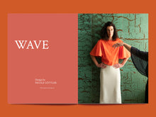 Load image into Gallery viewer, Double page magazine spread features the text 'Wave" alongside image of lady wearing a blouse with flutter sleeves