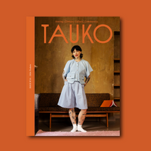 Load image into Gallery viewer, Front cover for TAUKO magazine, with model wearing a short sleeve jacket with giant pockets at front, worn with culottes