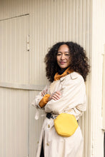 Load image into Gallery viewer, Lady wears a mac with a hexagonal bag across body.