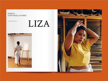 Load image into Gallery viewer, Magazine spread with article title: "Liza" alongside photo of lady wearing a cropped shirt