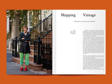 Load image into Gallery viewer, Magazine spread features photo of lady at the bottom of apartment block stairs next to an article titled "Mapping Vintage".