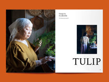 Load image into Gallery viewer, Magazine spread features a photo of lady in a v-neck top and gathered sleeve head, with sheer headscarf, alongside article title: "Tulip"