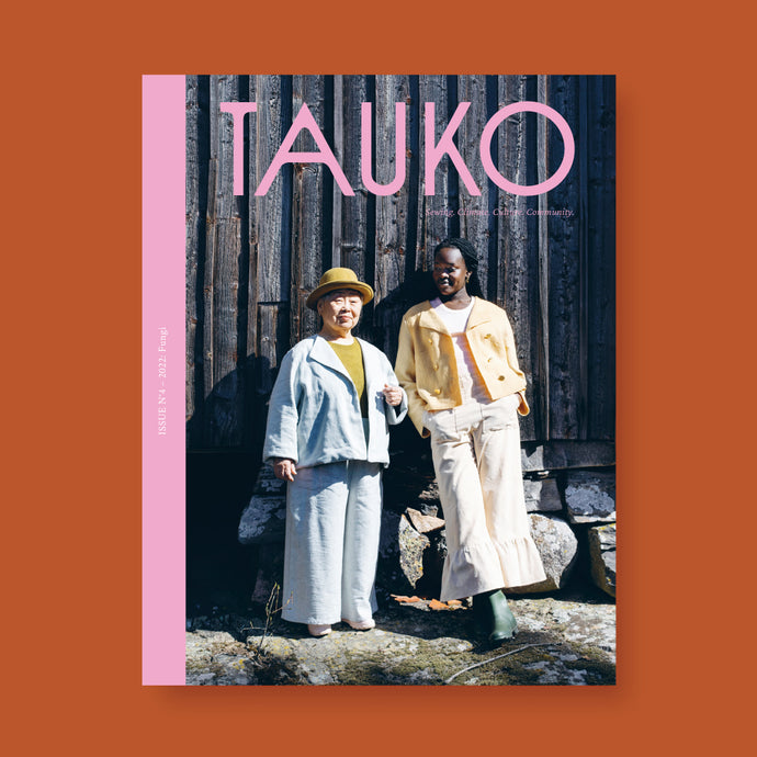 TAUKO magazine cover, issue 4 features two ladies wearing a boxy jacket with wide legged trousers