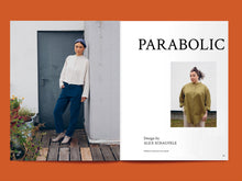 Load image into Gallery viewer, Magazine spread features a photo of lady wearing a long sleeve button fronted shirt, next to the title: "Parabolic".