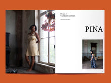 Load image into Gallery viewer, Magazine spread features photo of lady wearing a short dress, sleeveless, V-neck, alongside title: "Pina".