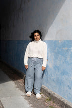Load image into Gallery viewer, Lady wears a jumper with checkered elasticated waist trousers