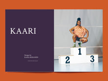 Load image into Gallery viewer, Lady crouches on top of first place on sports podium