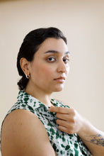 Load image into Gallery viewer, Close up image of lady wearing a collared sleeveless garment