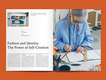 Load image into Gallery viewer, Two page open magazine spread, one side reads text titled "Fashion and Identity: The Power of Self-Creation", the right page features image on model drawing in a sketchbook
